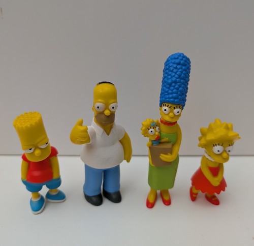The simpsons action figures - action,